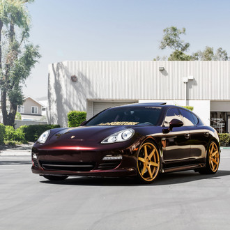 Dark Red Porsche Panamera with Custom Headlights - Photo by Concept One