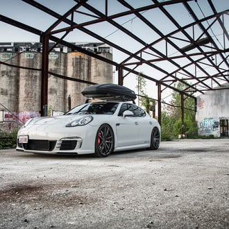 White Lowered Porsche Panamera with Thule Roof Rack - Photo by Rohana Whels