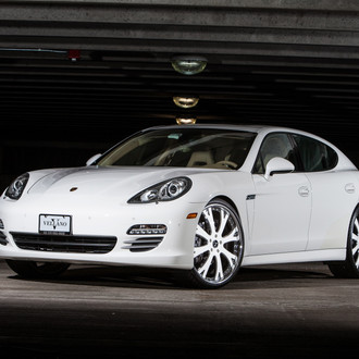 White Porsche Panamera with Aftermarket Halo Headlights - Photo by Vellano