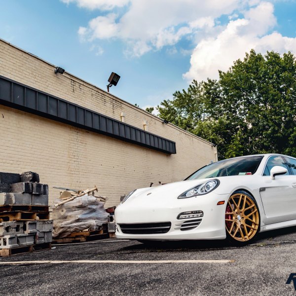 White Porsche Panamera with Crystal Clear Halo Headlights - Photo by Rennen International