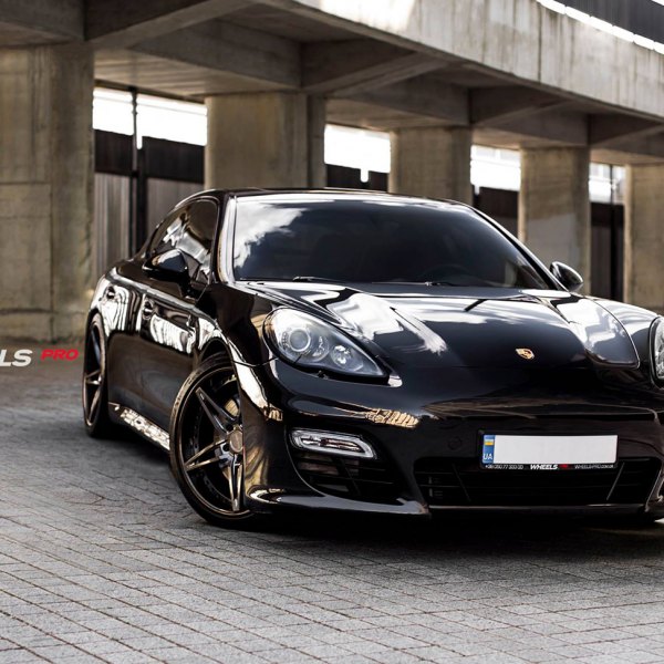 Front Bumper with Fog Lights on Black Porsche Panamera - Photo by PUR Wheels