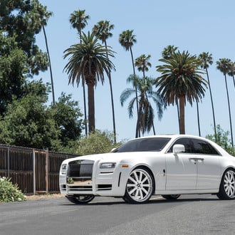 Custom White Rolls Royce Ghost with Chrome Grille - Photo by Forgiato