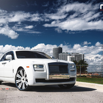 White Rolls Royce Ghost with Chrome Billet Grille - Photo by Vellano