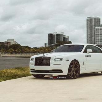 Bronze Accents Accentuate White Rolls Royce Wraith in a Nice Way