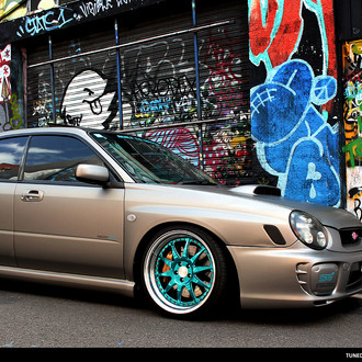 Gray Subaru WRX with Aftermarket Hood - Photo by Avant Garde Wheels
