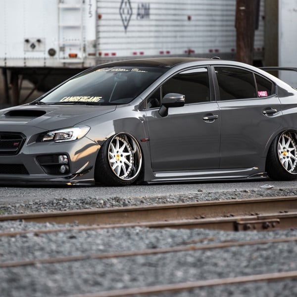 Aftermarket Body Kit on Gray Stanced Subaru WRX - Photo by Avant Garde Wheels