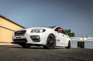 White Subaru WRX Boasting a Set of Carbon Graphite Vorsteiner Rims