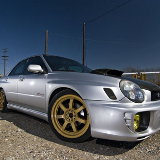 Front Bumper with Fog Lights on Gray Subaru WRX - Photo by dan kinzie