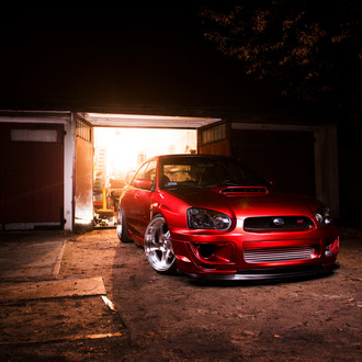 Red Subaru WRX STI with Custom Body Kit - Photo by JR Wheels