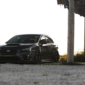 Front Bumper with Fog Lights on Black Subaru WRX - Photo by Vossen