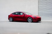 Where Technology and Style Merge: Red Tesla Model 3 Rocking Avant Garde Wheels