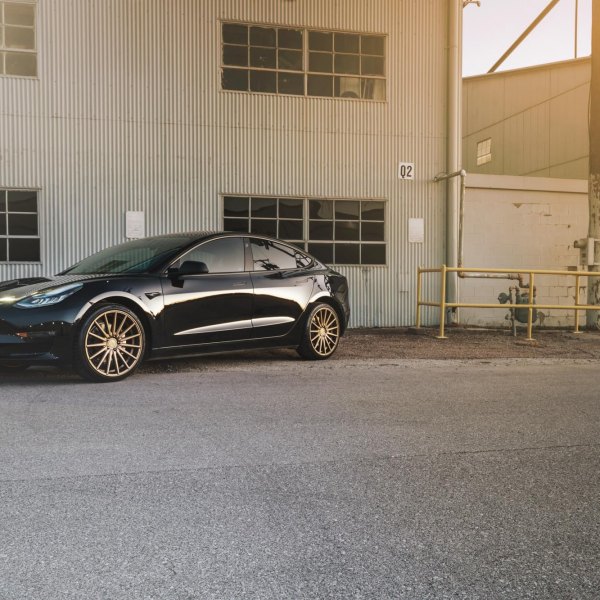 Black Tesla Model 3 with Aftermarket Front Bumper - Photo by Vossen