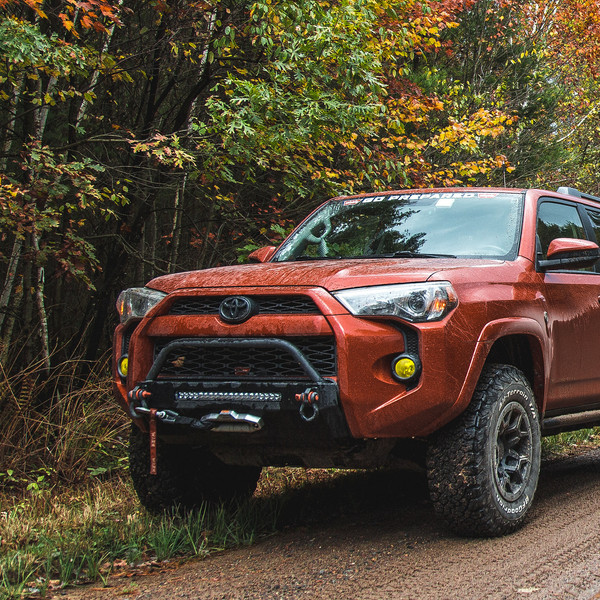 Warn Winch Grille Guard on Red Toyota 4Runner - Photo by Black Rhino