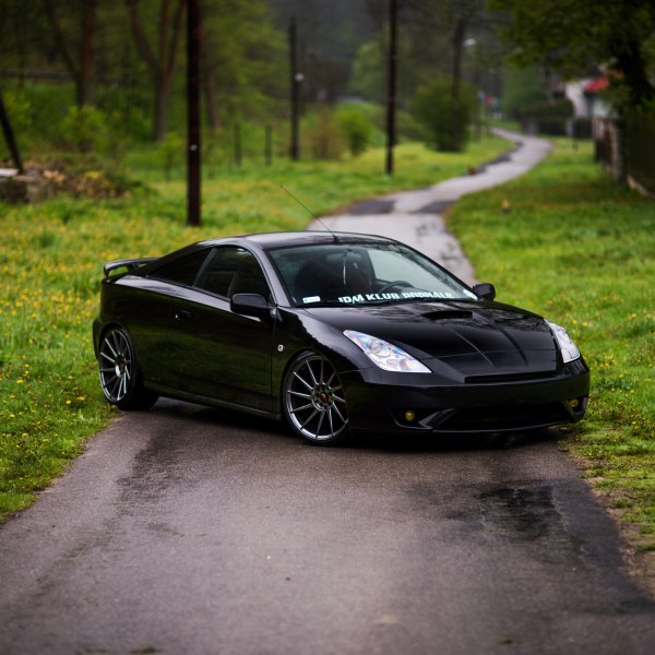 Black Toyota Celica with Crystal Clear Headlights - Photo by JR Wheels