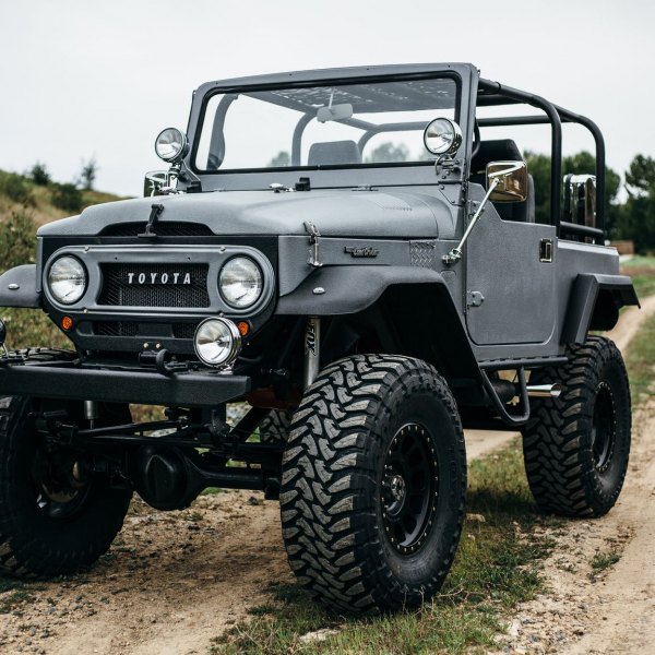 Gray Lifted Toyota Land Cruiser with Custom Front Bumper - Photo by Rebel Off-Road