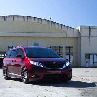 Red Toyota Sienna with Aftermarket Front Bumper - Photo by Vossen