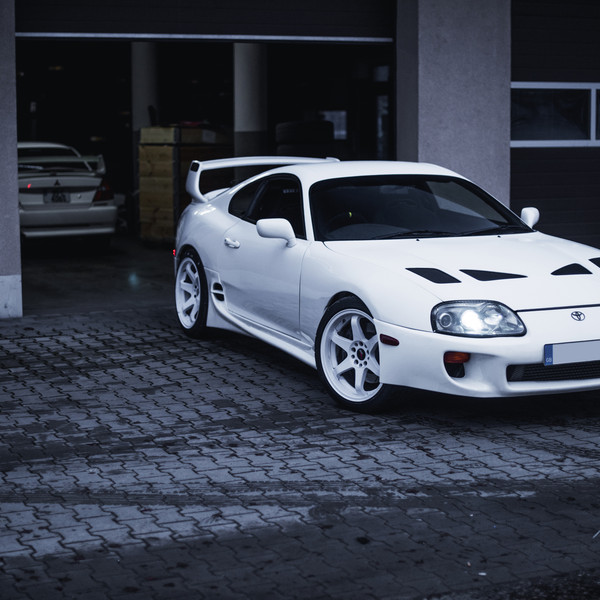 White Toyota Supra with Custom Vented Hood - Photo by JR Wheels
