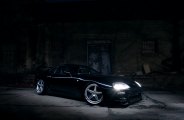 Black Toyota Supra Sitting Tight on a Set of Silver JR Wheels