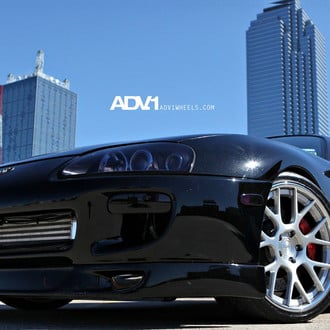 Aftermarket Front Lip on Black Toyota Supra - Photo by ADV.1