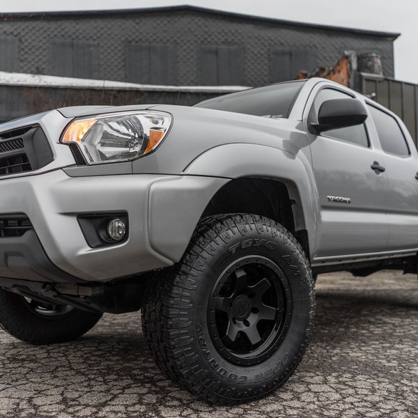 Gray Lifted Toyota Tacoma with Custom Bumper Guard - Photo by Rotiform