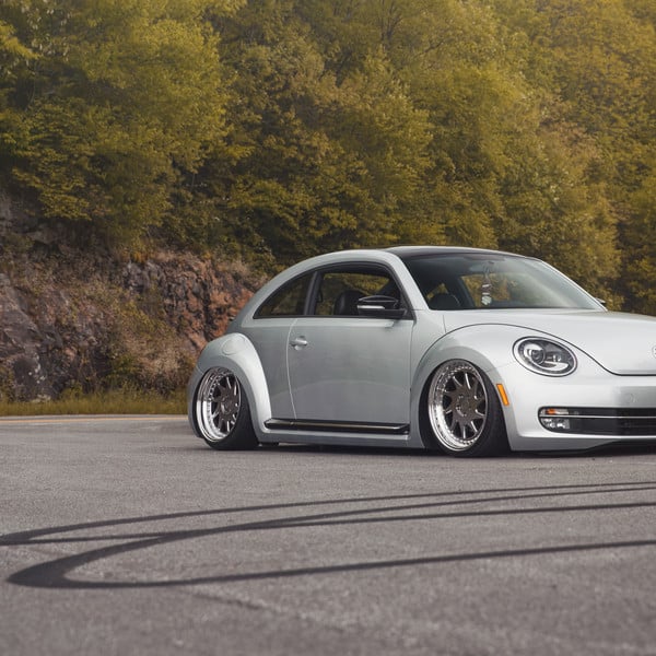 Silver Stanced VW Beetle with Aftermarket Front Bumper - Photo by Rotiform
