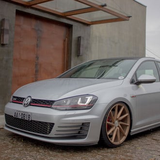 Custom LED-Bar Style Headlights on Gray VW Golf - Photo by Vossen