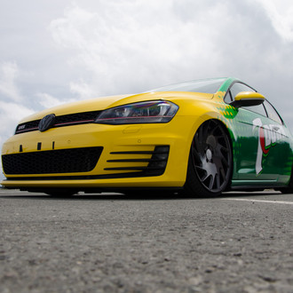 Custom Yellow Green VW Golf with Blacked Out Grille - Photo by Vossen