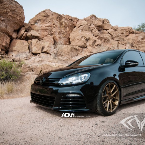 Black VW Golf with Aftermarket Front Bumper - Photo by ADV.1