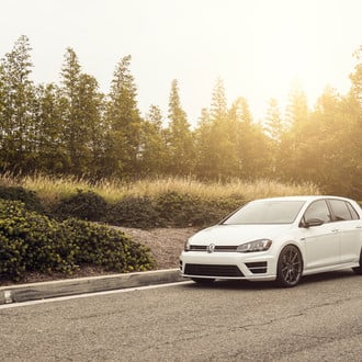 White VW Golf with Custom Front Bumper - Photo by Avant Garde Wheels