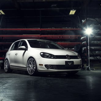 White VW Golf with Dark Smoke Headlights - Photo by Vorstiner
