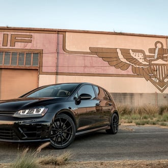 All- Black VW Golf Wearing Custom Headlights