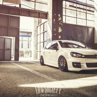 Dark Smoke Headlights on White VW Golf - Photo by Ciprian Mihai