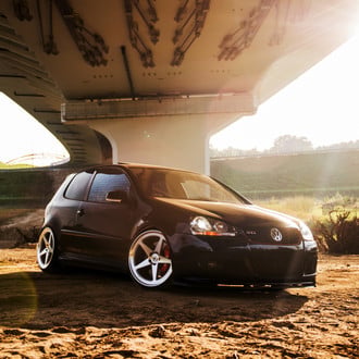 Aftermarket Projector Headlights on Black VW Golf - Photo by JR Wheels