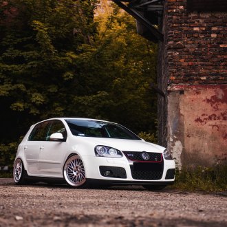 Slammed Beauty: Black VW Golf GTI on Custom Rims — CARiD.com Gallery