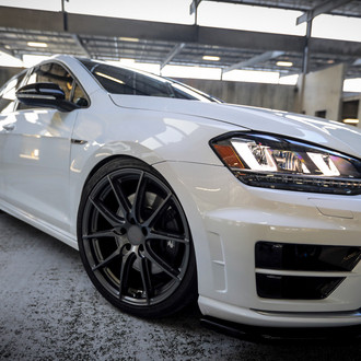 Glossy White VW Golf Reworked to Awe with Contrasting Black Accents