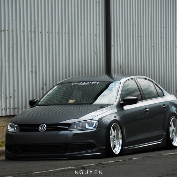 Aftermarket Headlights on Gray VW Jetta - Photo by Avant Garde Wheels