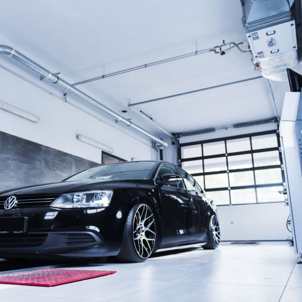 Black VW Jetta with Aftermarket Front Bumper - Photo by JR Wheels