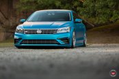 Slammed Passat With a Chrome Blue Wrap on Accuair Suspension and Vossens