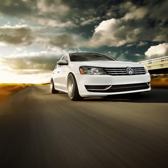 White VW Passat with Chrome Grille - Photo by Vossen