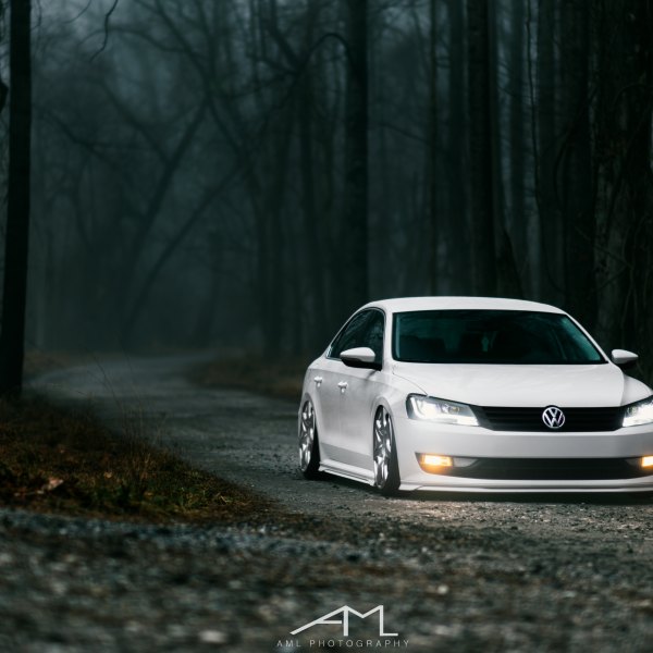White Lowered VW Passat with Aftermarket Front Bumper - Photo by Arlen Liverman