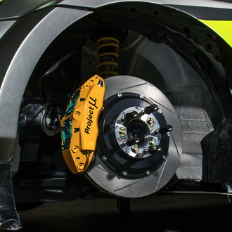 Project Mu® - Yellow Calliper On Car