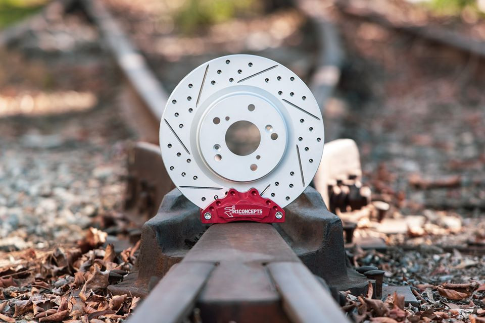 Drilled Brake Rotor and Red Caliper