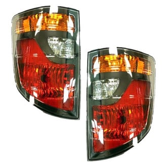 Replace® - Driver and Passenger Side Replacement Tail Light Lens and Housings (Value Line)