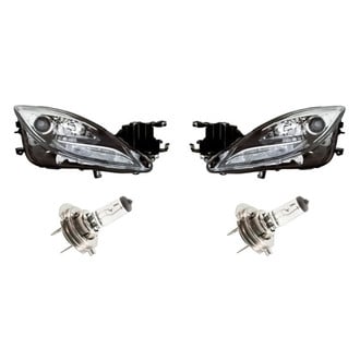 Replacement - 4-Piece Kit (Driver and Passenger Side Headlights, Bulbs) (Standard Line)