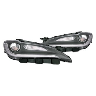Replacement - Driver and Passenger Side Headlight Set (CAPA Certified)