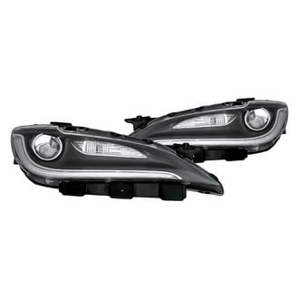 Replacement - Driver and Passenger Side Headlight Set (Standard Line)