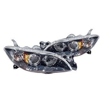 Replacement - Driver and Passenger Side Headlight Set Lens and Housing (Standard Line)