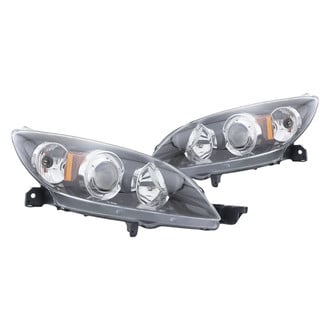 Replacement - Driver and Passenger Side Headlight Set Lens and Housing (Standard Line)