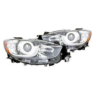 Replacement - Driver and Passenger Side Headlight Set Lens and Housing (Standard Line)