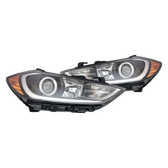 Replacement - Driver and Passenger Side Headlight Set (Standard Line)